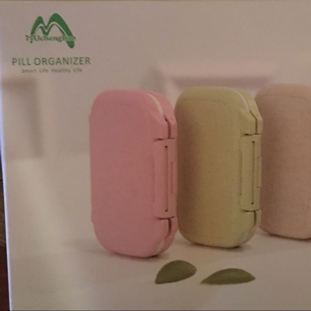 New, travel size pill organizers.